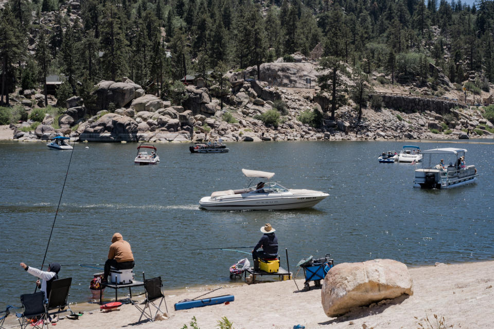 Image: Tourists and locals at Pine Oak Lane North Beach on Big Bear Lake on June 19, 2022. (Gabriella Angotti-Jones for NBC News)