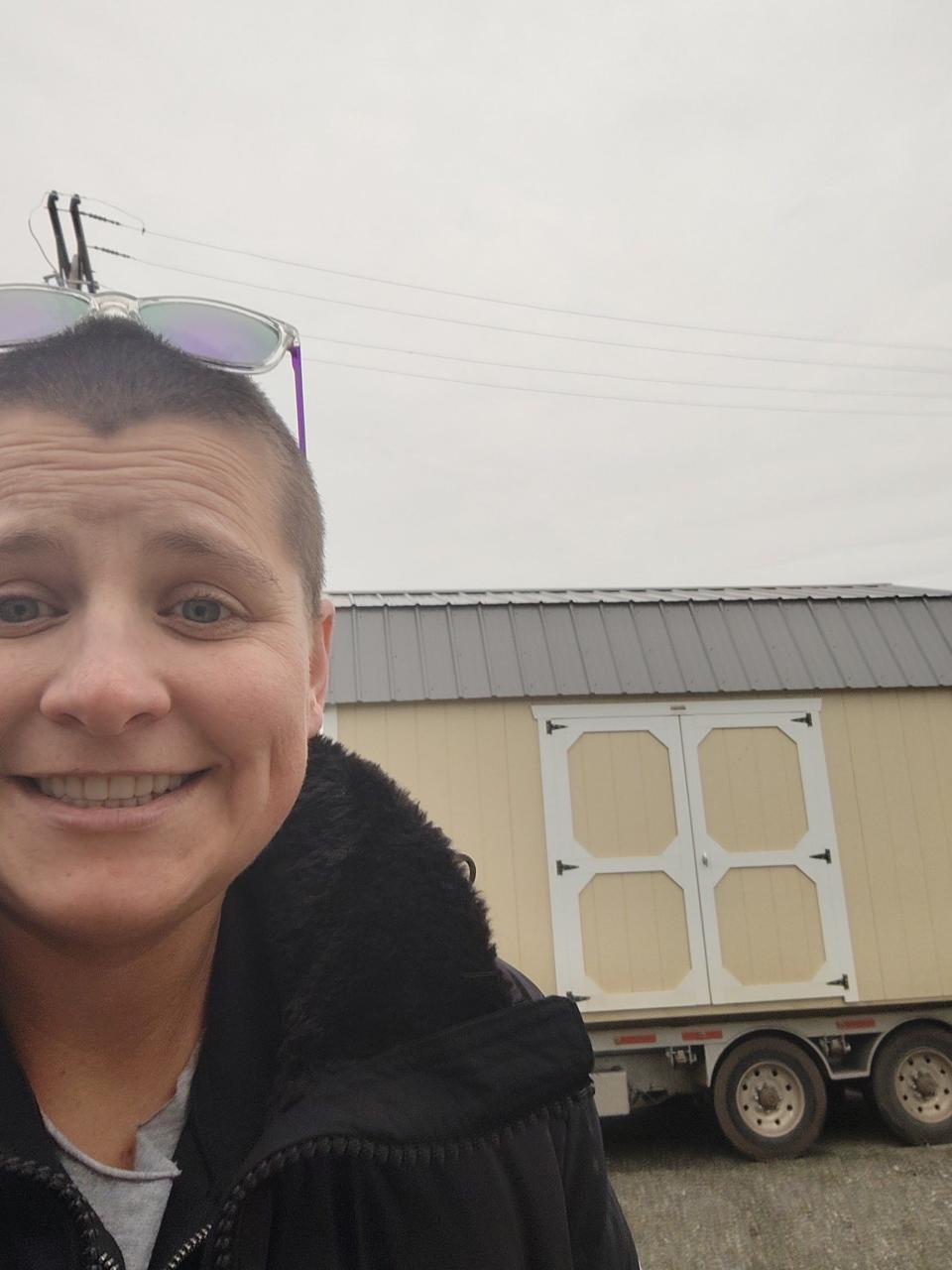 Yreka Basecamp’s program manager Tara Kilcollins takes a selfie at the site of Yreka Basecamp. The low-barrier homeless shelter will open as early as June 2024, she said.