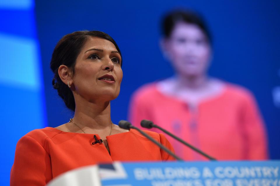 Britain's International Development Secretary Priti Patel delivers her speech on the third day of the Conservative Party annual conference at the Manchester Central Convention Centre in Manchester on October 3, 2017. / AFP PHOTO / Oli SCARFF (Photo credit should read OLI SCARFF/AFP via Getty Images)