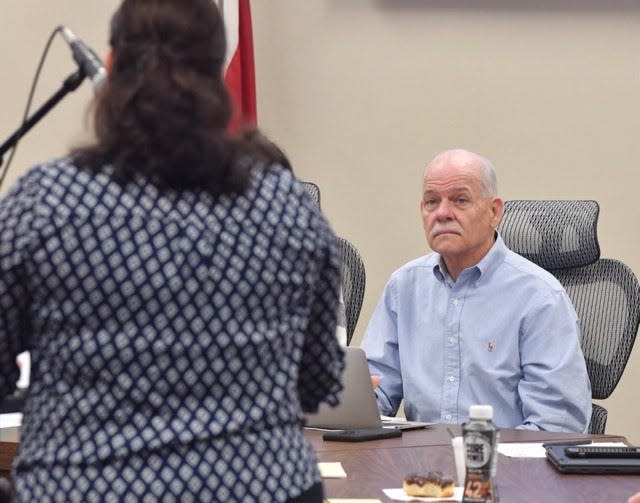 Wichita Falls ISD School Board member Mark Lukert listens as former district teacher Melanie Krotzer speaks during a special session April 29, 2022.