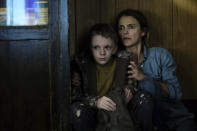 This image released by Searchlight Pictures shows Jeremy T. Thomas, left, and Keri Russell in a scene from "Antlers." (Kimberly French/Searchlight Pictures via AP)