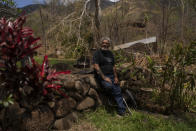 Keʻeaumoku Kapu poses for photos on his taro farm near Lahaina, Hawaii, Wednesday, Aug. 16, 2023. A deadly Maui wildfire is renewing tensions over Maui stream water rights. (AP Photo/Jae C. Hong)
