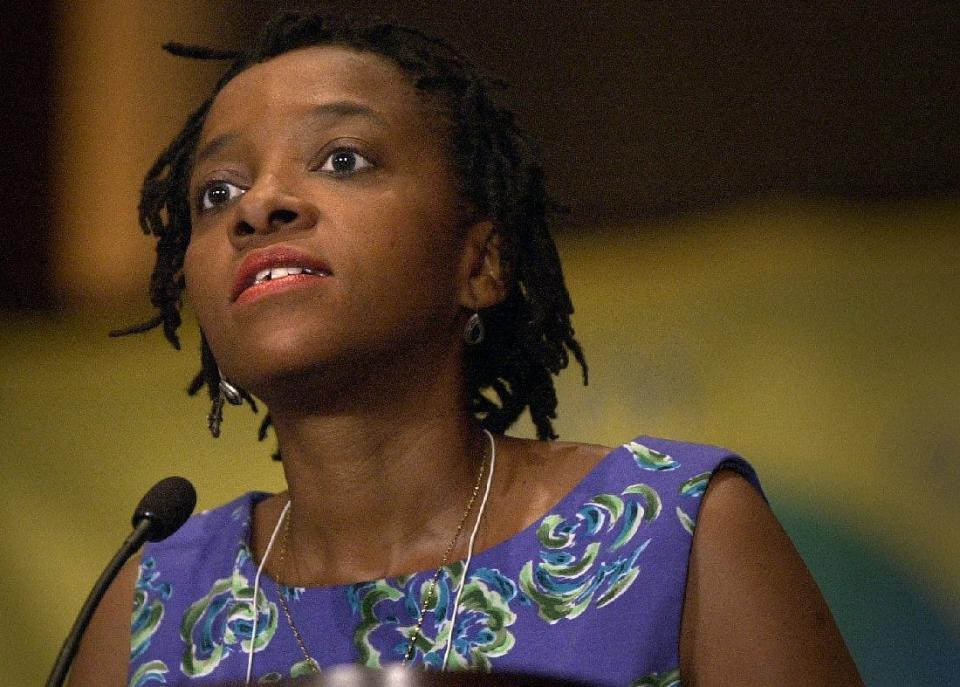 Dr. Naomi Tutu, daughter of retired South African Archbishop Desmond Tutu and program director of the Race Relations Institute at Fish Universtiy, gives the keynote speech Friday, July 27, 2001, at the Church Women United 2001 at the Midwest Express Center.