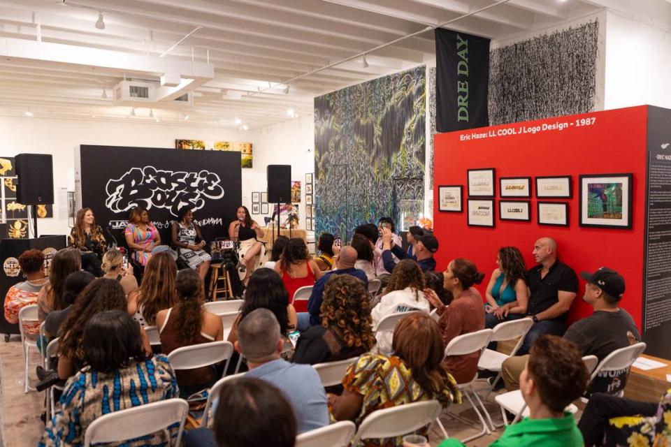 A crowd listens to a panel of female Miami radio legends Supa Cindy, Stichiz and Lucy Lopez at The Art of Hip Hop in Wynwood in celebration of Women’s History Month. World Red Eye/Courtesy of The Art of Hip Hop