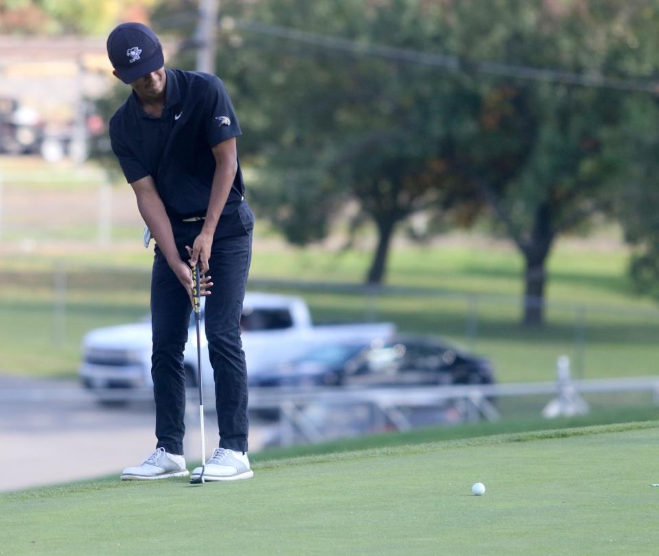 Corning's Nishant Lahiri putts on the 18th hole at Mark Twain Golf Course during the Southern Tier Athletic Conference golf championships Oct. 11, 2022.
