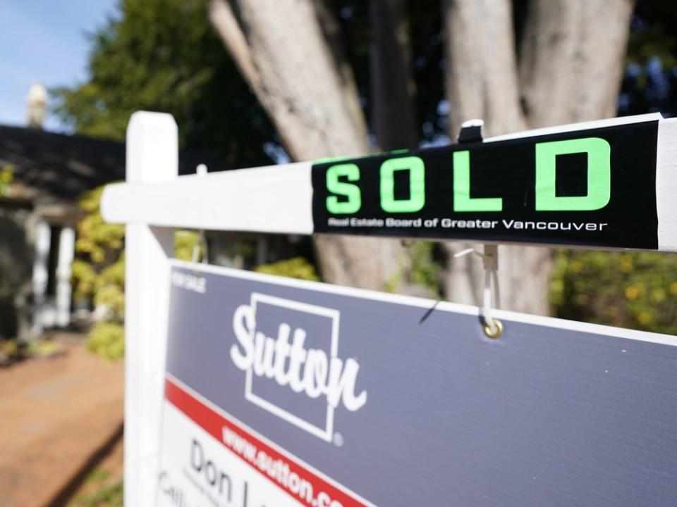  A sold sign in front of a home in Vancouver.