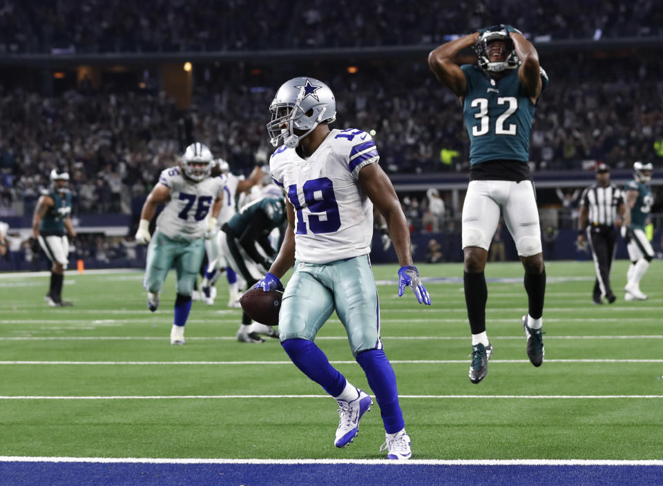 Dallas Cowboys wide receiver Amari Cooper (19) scores a 15-yard touchdown in overtime against the Eagles. (AP)