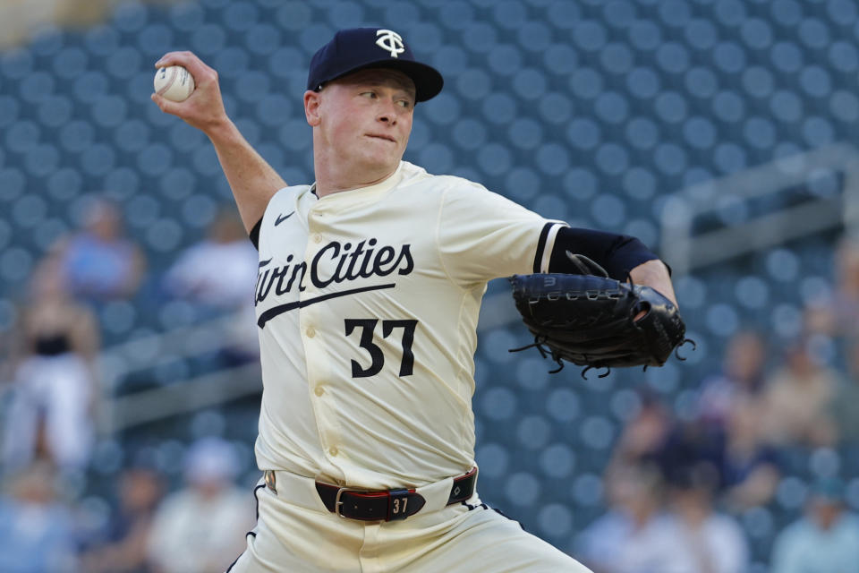 Minnesota Twins starting pitcher Louie Varland throws to a Colorado Rockies batter during the first inning of a baseball game Tuesday, June 11, 2024, in Minneapolis. (AP Photo/Bruce Kluckhohn)