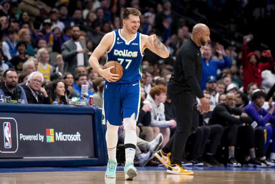 Dallas Mavericks guard Luka Doncic smiles after a foul is called on him in the second half of an NBA basketball game against the Los Angeles Lakers in Dallas, Sunday, Dec. 25, 2022. (AP Photo/Emil T. Lippe)