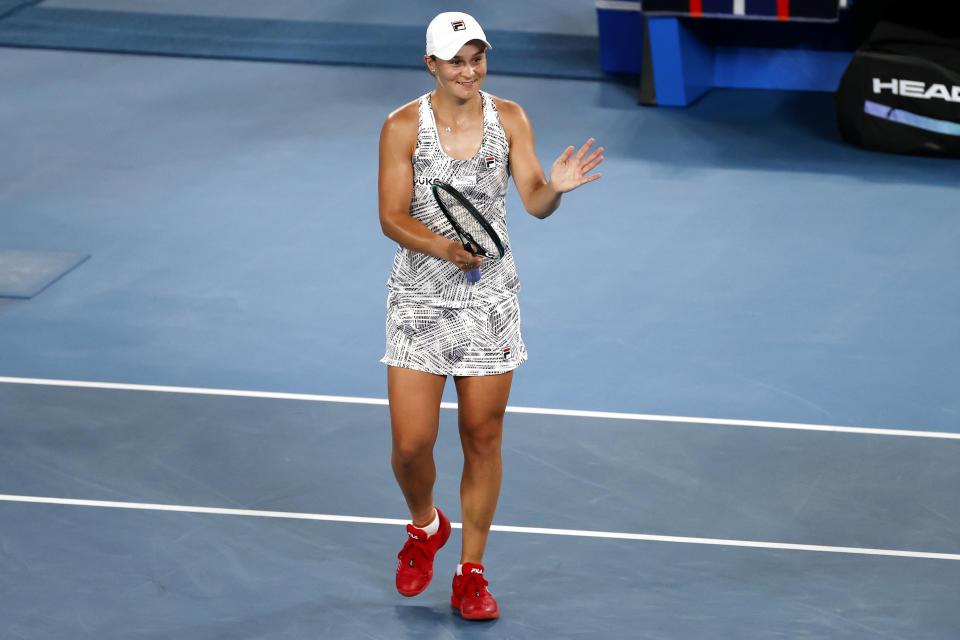 Ash Barty of Australia reacts after defeating Madison Keys of the U.S. in their semifinal match at the Australian Open tennis championships in Melbourne, Australia, Thursday, Jan. 27, 2022. (AP Photo/Tertius Pickard)