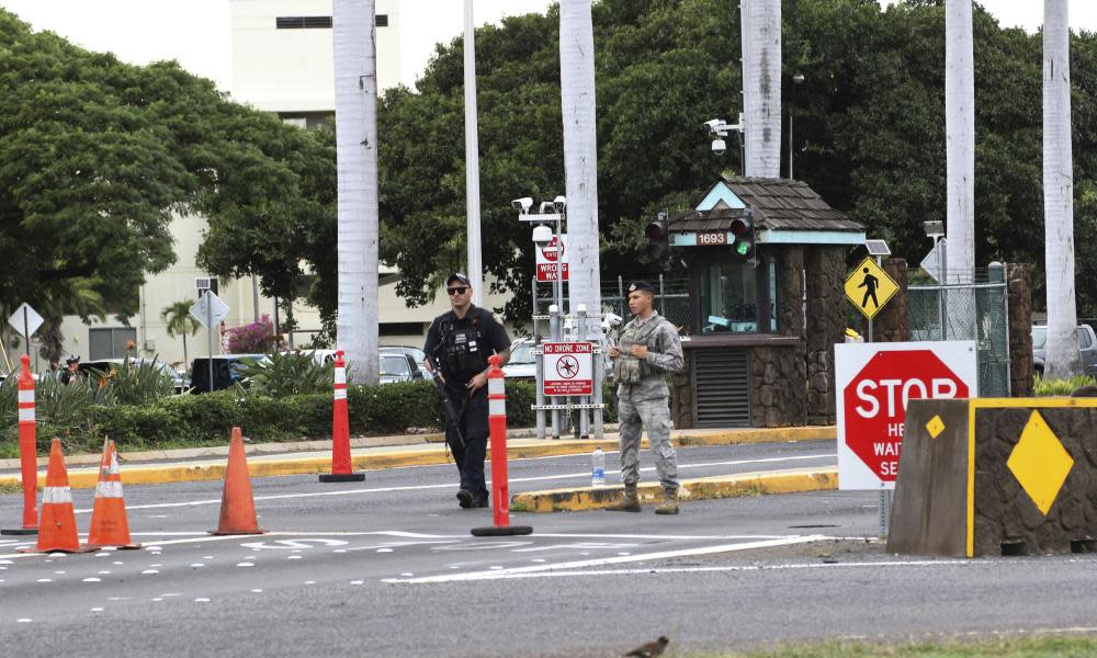 <span>Photograph: Caleb Jones/AP</span>