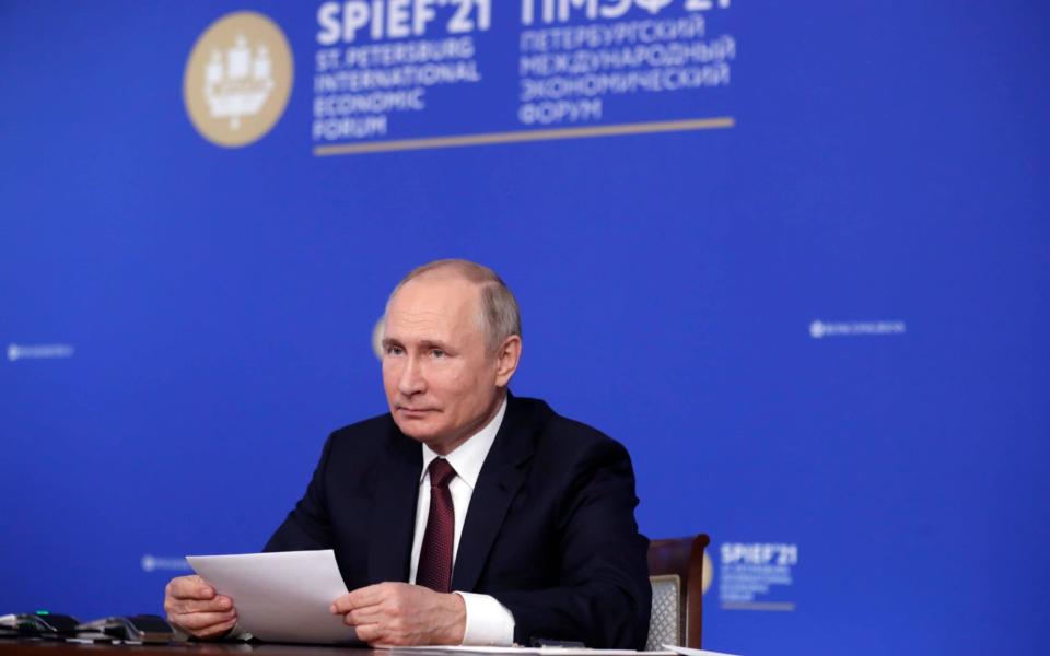 Russian President Vladimir Putin attends a video conference meeting during the St. Petersburg International Economic Forum on June 4 2021 - Mikhail Metzel/Shutterstock