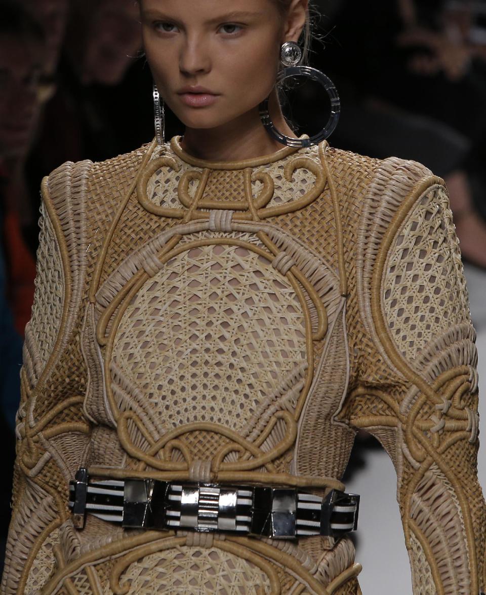 A model wears a creation by French designer Olivier Rousteing for Balmain's spring-summer 2013 ready to wear collection in Paris, Thursday, Sept. 27, 2012. (AP Photo/Francois Mori)