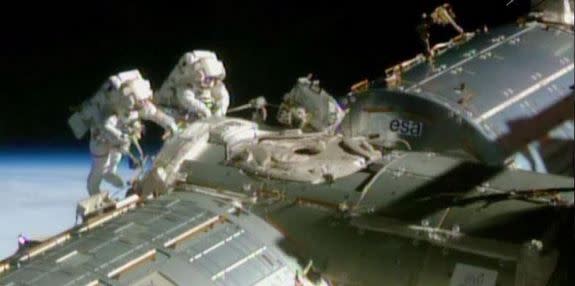 Astronauts Barry Wilmore (left) and Terry Virts outside the International Space Station during a successful spacewalk on Feb. 20.