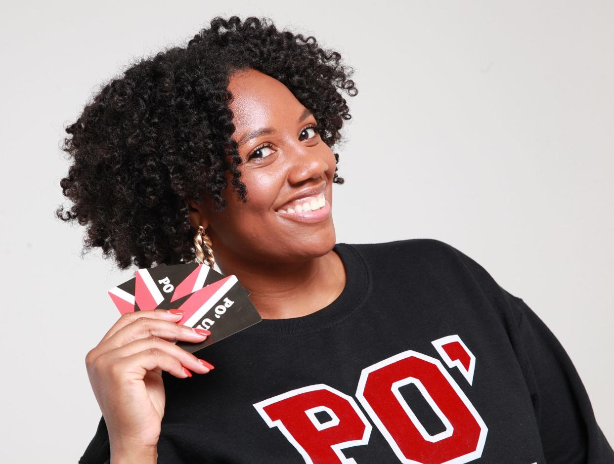 This promotional photo from May 2022 shows University of Georgia graduate Lizz Rene, the creator of PO' UP! Card Game. The game was inspired by Rene's experiences as a Black student at UGA.