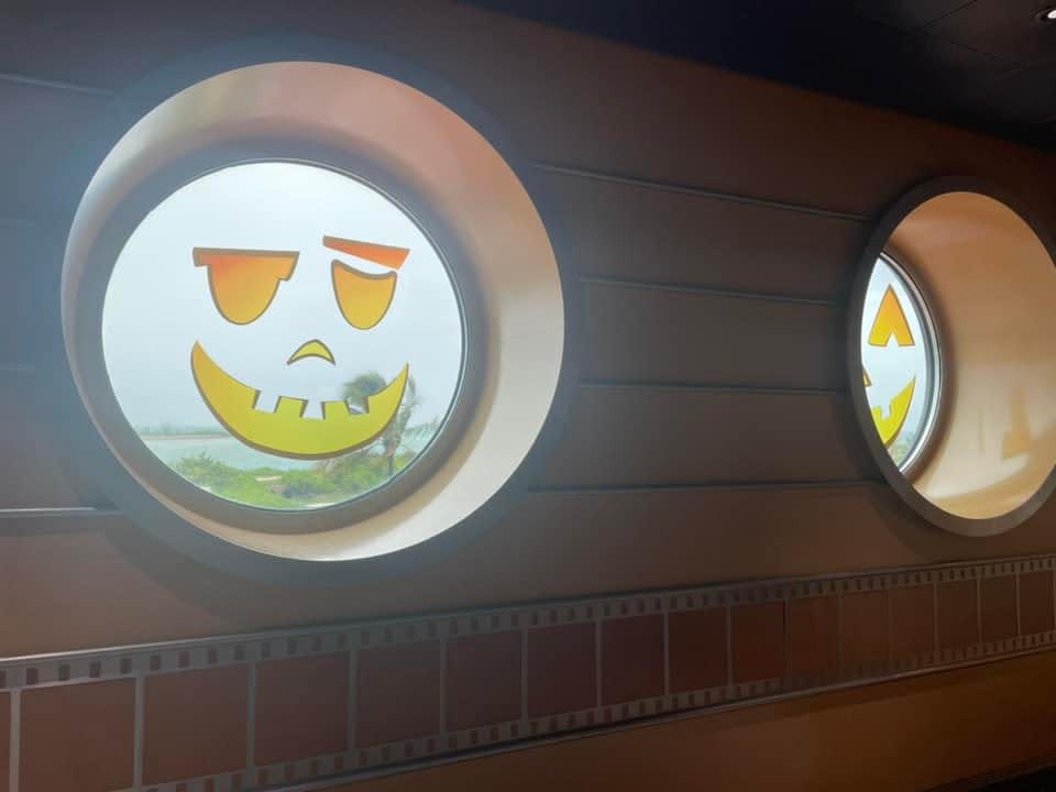 Disney Halloween on the High Seas Cruise - a jack o lantern face in ship window