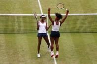 <p>Serena Williams (R) and Venus Williams (L) of the United States celebrate after defeating Andrea Hlavackova and Lucie Hradecka of Czech Republic in the Women’s Doubles Tennis gold medal match on Day 9 of the London 2012 Olympic Games at the All England Lawn Tennis and Croquet Club on August 5, 2012 in London, England. (Photo by Clive Brunskill/Getty Images) </p>