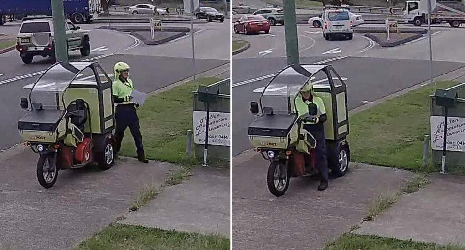 The Australia Post worker taking the parcel out of his bag and writing a collection card. Source: Facebook