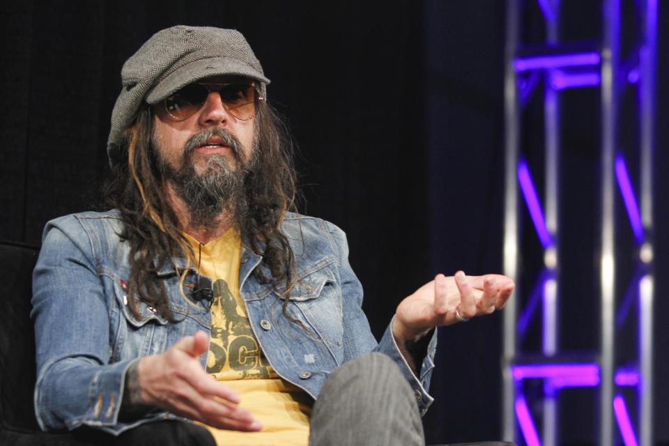 FILE - This March 12, 2013 file photo shows musician-actor Rob Zombie talking about his new film "Lords of Salem" at the SXSW Film Festival in Austin, Texas. Zombie released his fifth studio album, “Venomous Rat Regeneration Vendor,” last month, and he plans to support the record with a summer tour of the states, and an appearance at the Rock in Rio Festival in Brazil. (Photo by Jack Plunkett/Invision/AP, file)