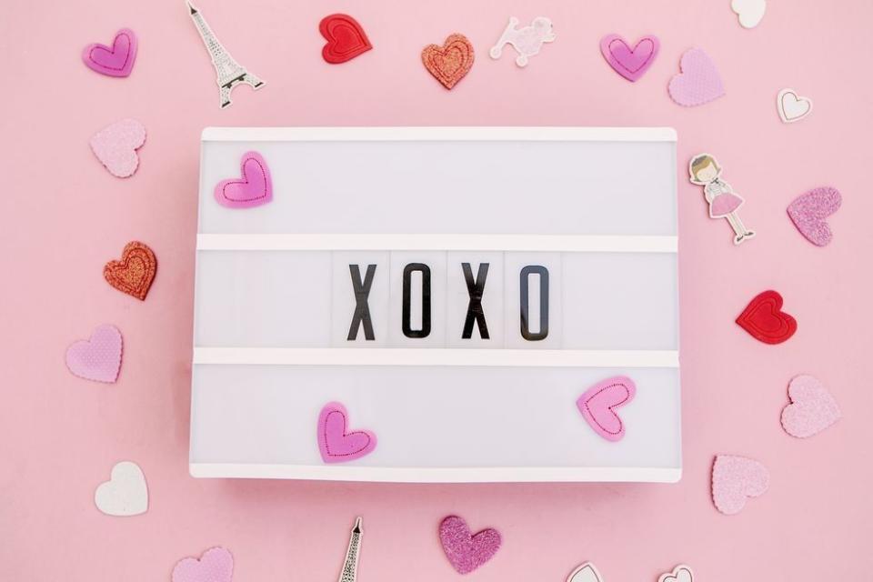 x's and o's in a lightbox spelling out the valendtine's day message xoxo, meaning hugs and kisses