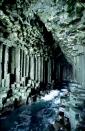 <p>Beyond the entrance of Fingal’s Cave, hexagonal columns of basalt jut out of the swirling surf. Located on the wild Isle of Staffa in the Hebrides, this otherworldly cavern was formed millions of years ago when a volcanic eruption sent lava spilling out into the sea. Known to the Celts as Uamh-Binn, or ‘Cave of Melody’, the grotto is famed for its natural acoustics – crashing waves reverberating around the walls like a coastal cathedral. A source of inspiration for everyone from composer Felix Mendelssohn to the members of Pink Floyd, this natural wonder also appeared in Jules Verne’s Journey to the Centre of the World.</p><p><a class="link " href="https://www.visitscotland.com/see-do/unique-experiences-map/seeing-a-unique-cave/" rel="nofollow noopener" target="_blank" data-ylk="slk:MORE INFO;elm:context_link;itc:0;sec:content-canvas">MORE INFO</a></p>