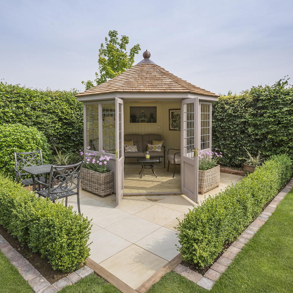 garden with flowerbeds and room