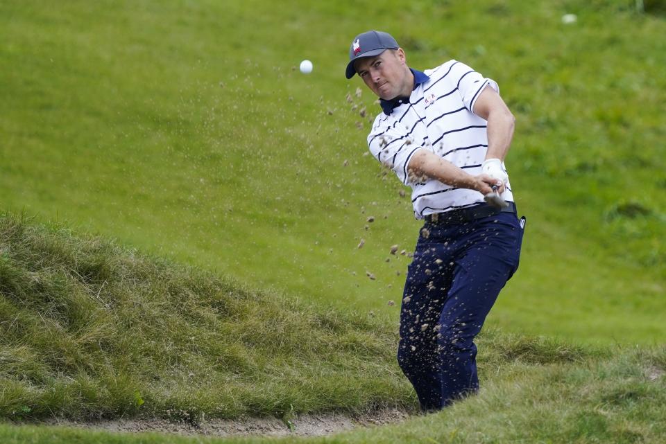 Team USA's Jordan Spieth hits from a bunker on the first hole during a practice day at the Ryder Cup at the Whistling Straits Golf Course Tuesday, Sept. 21, 2021, in Sheboygan, Wis. (AP Photo/Charlie Neibergall)