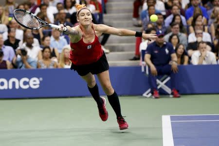 Bethanie Mattek-Sands of the U.S. returns a ball during her match with Serena Williams of the U.S. at the U.S. Open Championships tennis tournament in New York, September 4, 2015. REUTERS/Shannon Stapleton