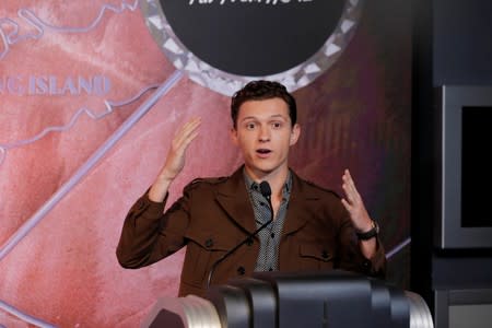 Actor Tom Holland speaks before a ceremony to light the top of the Empire State Building to promote the film, Spider-Man: Far From Home in New York