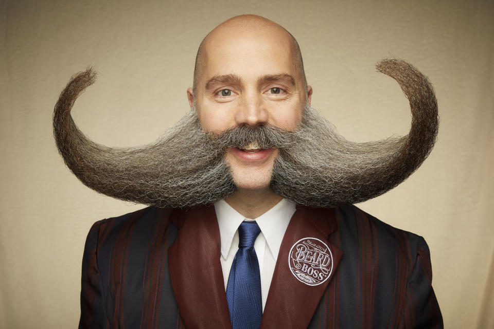 This extreme moustache-beard-sideburns combination defies gravity. 