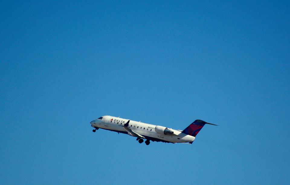 Plane leaves LaGuardia Airport in New York City.
