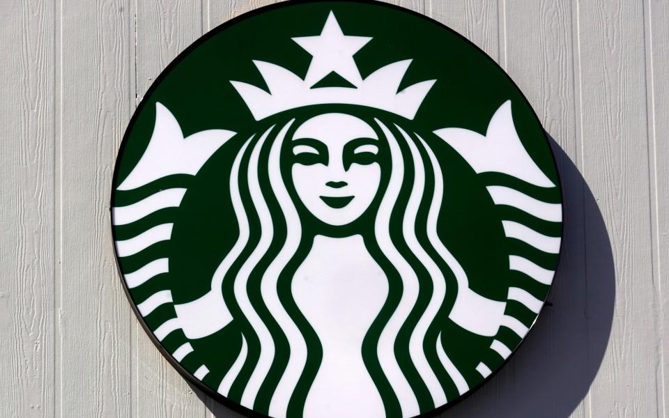 Starbucks logo - AP Photo/Charles Krupa