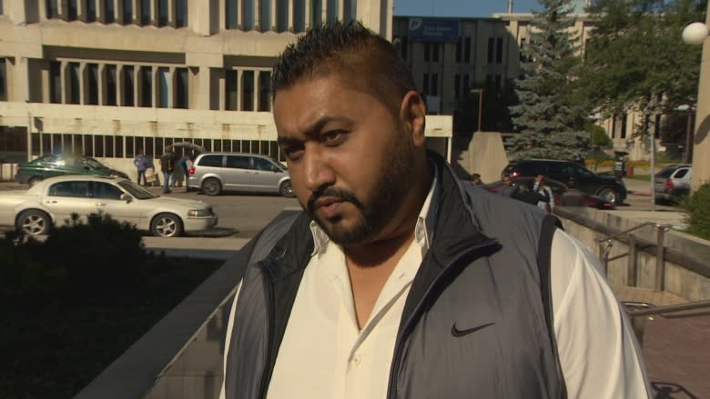 Winnipeg mayor claims he was threatened by taxi industry over ride-hailing regulations