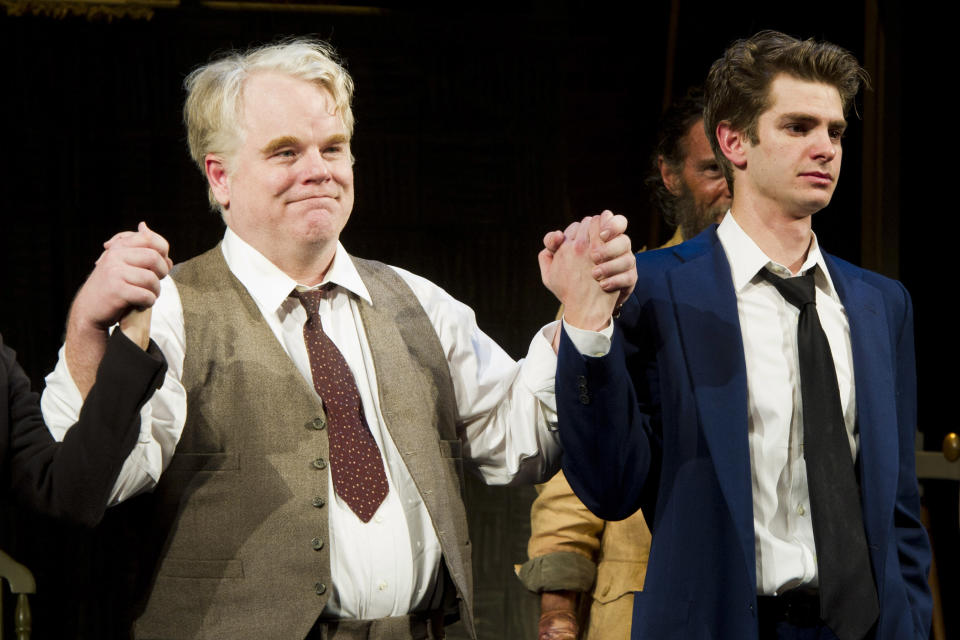 FILE - In this March 15, 2012 file photo, actors Philip Seymour Hoffman, left, and Andrew Garfield appear at the curtain call for the opening night performance of the Broadway revival of Arthur Miller's "Death of A Salesman" in New York. The Tony Awards will be held on June 10 and broadcast live on CBS. (AP Photo/Charles Sykes, file)