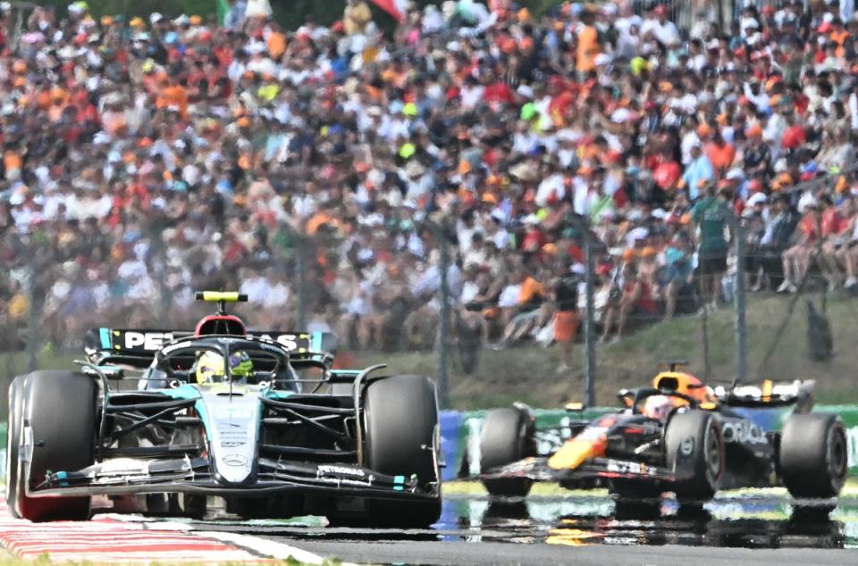 Max Verstappen and Lewis Hamilton were battling at the Hungarian Grand Prix (AFP via Getty Images)