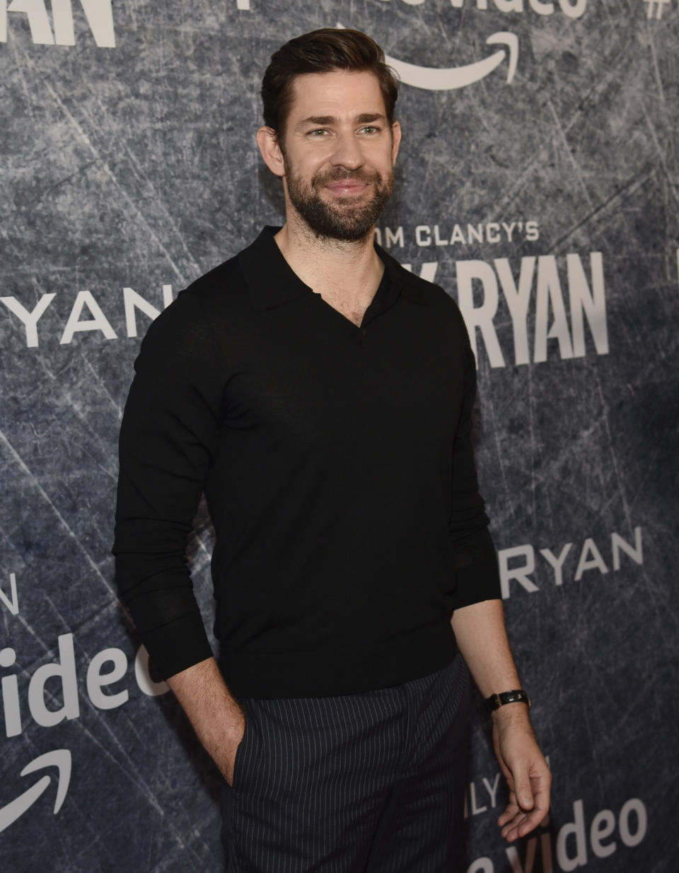 FILE - John Krasinski, star of "Tom Clancy's Jack Ryan," poses at the premiere of the television series on Aug. 31, 2018, in Los Angeles. Krasinski is among the entertainers who took the initiative to make the best out of a challenging year. The actor created a YouTube web series, "Some Good News," focusing on positive and inspiring stories. (Photo by Chris Pizzello/Invision/AP, File)