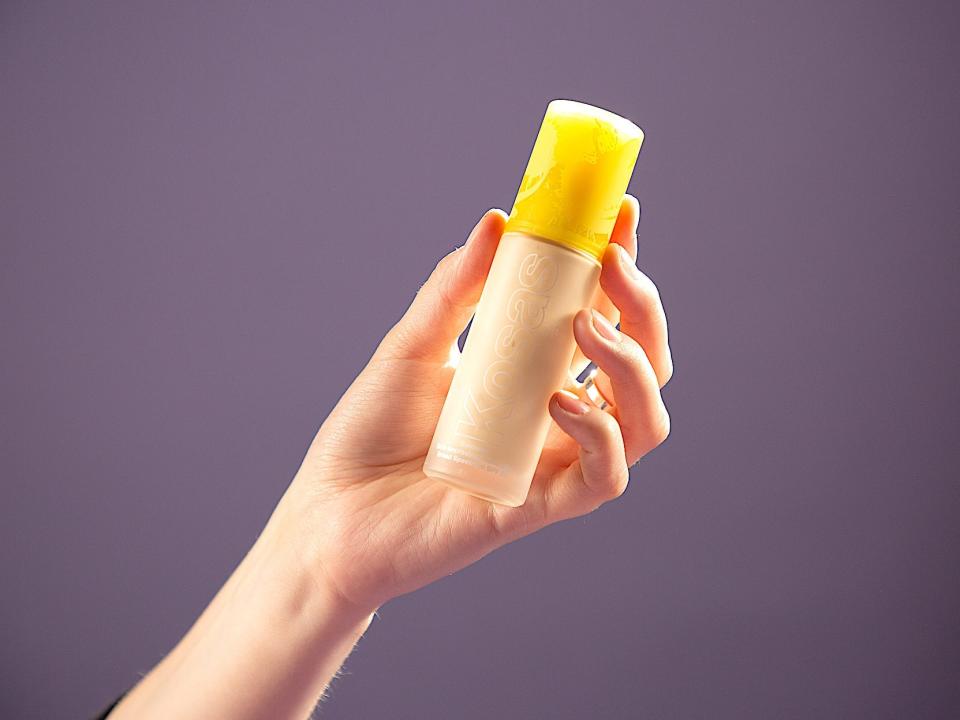 A bottle of the Kosas Revealer Skin-Improving foundation.