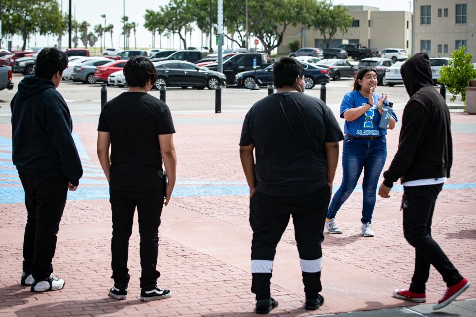 Texas A&M University-Corpus Christi Island Ambassador and student Hannah Velazquez leads a campus tour for individuals in foster care on Wednesday, June 15, 2022.