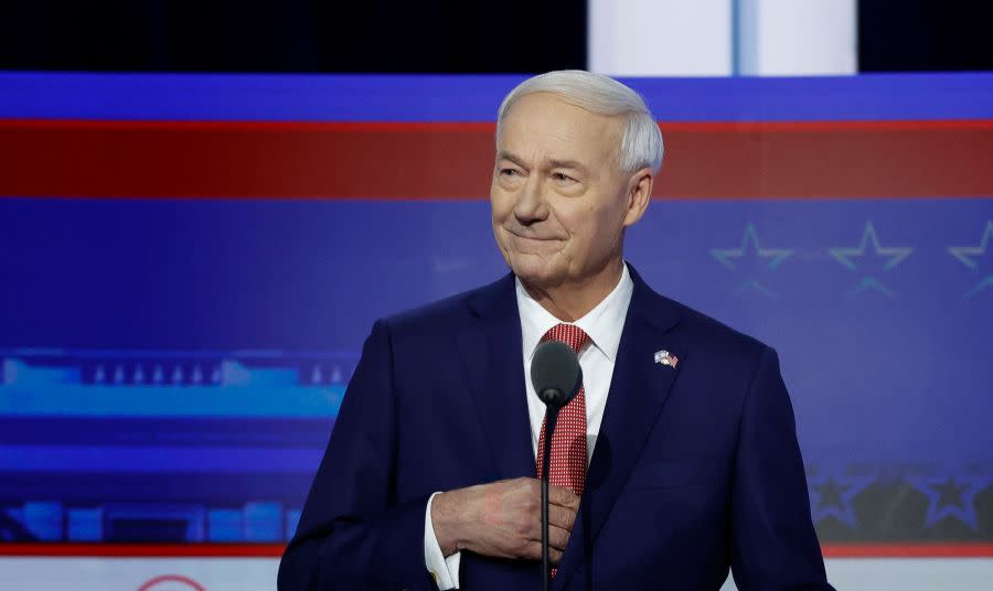 Former Governor of Arkansas Asa Hutchinson arrives to take part in the first Republican Presidential primary debate at the Fiserv Forum in Milwaukee, Wisconsin, on August 23, 2023. (Photo by KAMIL KRZACZYNSKI / AFP)