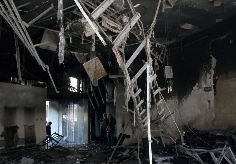 View of the damaged bank interior that was set ablaze during unrest overnight in Tripoli