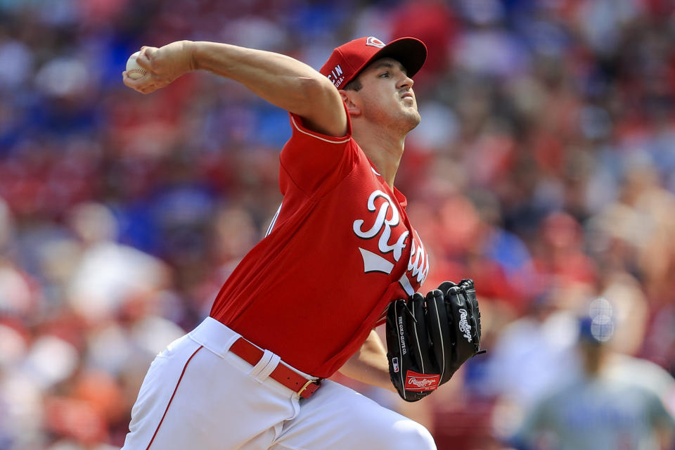 Cincinnati Reds' Tyler Mahle throws during the first inning of a baseball game against the Chicago Cubs in Cincinnati, Saturday, July 3, 2021. (AP Photo/Aaron Doster)