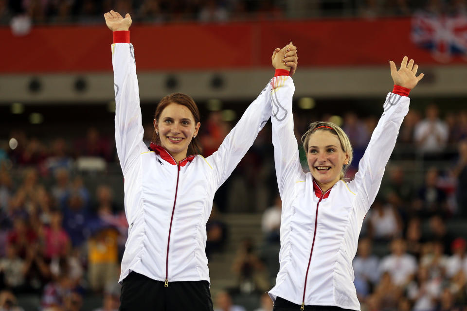 <b>Germans win gold after double relegation:</b> Germany ended up with gold in the Olympic women's track cycling team sprint after original winners China were relegated to second for a takeover infringement having earlier broken two world records. Hosts and medal hopefuls Britain had been disqualified in the first round for another illegal changeover.