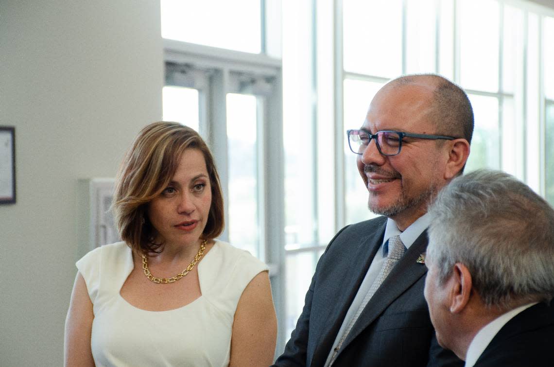 Colima-Pasco Friendship & Collaboration Association President Gabriel Portugal translates for musicians Mariana del Rocío Corona Delgado, left, and Miguel Angel Alatorre Álvarez, middle, during a Thursday tour of the Ste. Michelle Wine Estates WSU Wine Science Center in Richland, WA.