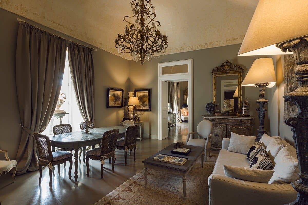 The elegant interiors feature frescoes, original tile floors and chandeliers (Seven Rooms Villadorata)