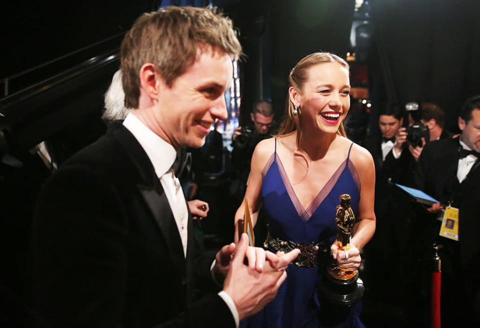 Eddie Redmayne congratulates Brie Larson backstage after she accepts the award for best actress in a leading role for “Room” at the Oscars on Sunday, Feb. 28, 2016, at the Dolby Theatre in Los Angeles. 