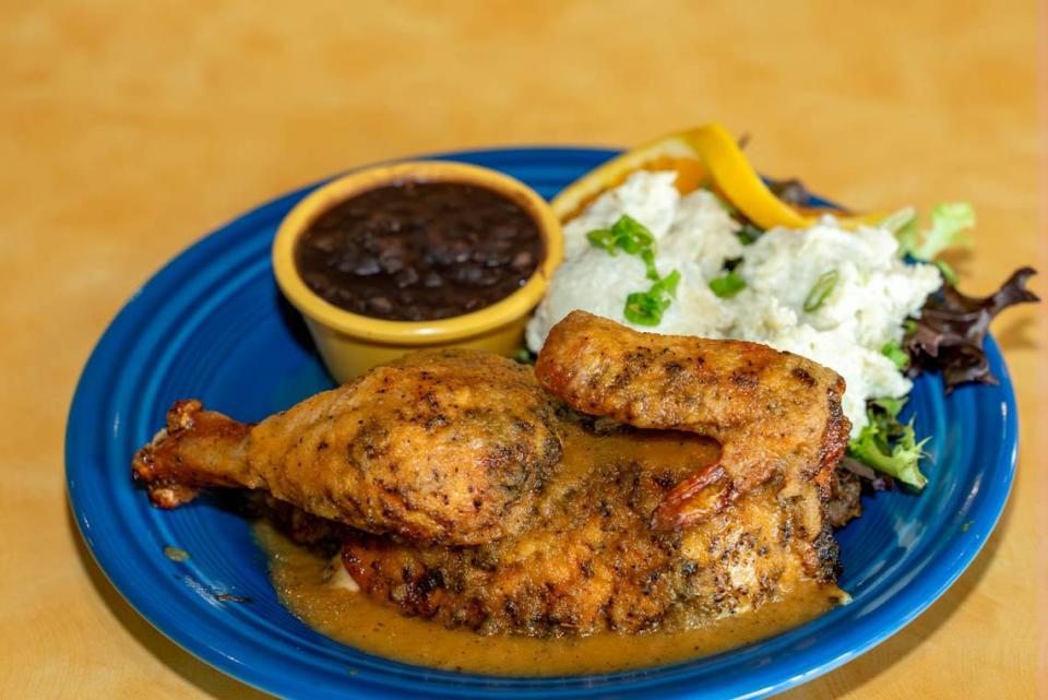 Anntony’s Caribbean Cafe’s half chicken with black beans and potato salad.