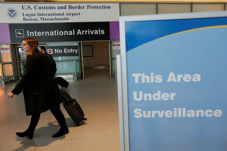 International travelers arrive at Logan Airport following a federal court's temporary stay of U.S. President Donald Trump's executive order travel ban in Boston, Massachusetts, U.S. February 6, 2017. REUTERS/Brian Snyder