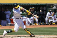 Oakland Athletics' Shea Langeliers hits a two-run home run during the second inning in the first baseball game of a doubleheader against the Texas Rangers, Wednesday, May 8, 2024, in Oakland, Calif. (AP Photo/Godofredo A. Vásquez)