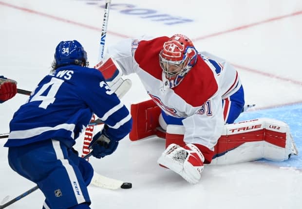 Montreal Canadiens goaltender Carey Price and Maple Leafs forward Auston Matthews are shown earlier in the series in Toronto. Both players will be on the spot in Game 7.   (Nathan Denette/The Canadian Press - image credit)