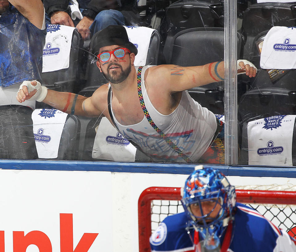 TORONTO, ON - JANUARY 19: An over exhuberant New York Rangers fan performs during the warm-up prior to action between the Toronto Maple Leafs and the New York Rangers in an NHL game at the Air Canada Centre on January 19, 2017 in Toronto, Ontario, Canada. The Rangers defeated the Maple Leafs 5-2. (Photo by Claus Andersen/Getty Images)